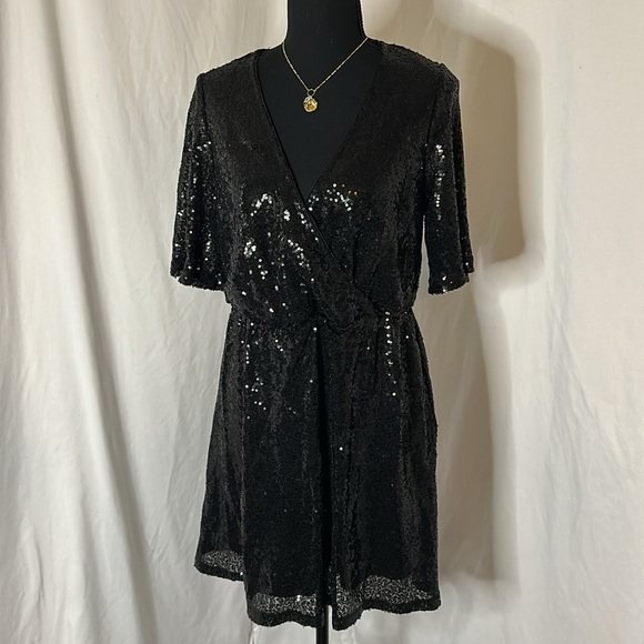 Vero Moda Dresses & Skirts - NWT VERA MODA faux‎ wrap front - black sequin dress